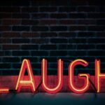 Laugh neon signage